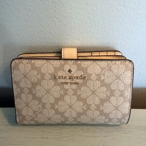 Kate Spade Signature Spade Flower design bi-fold Wallet
